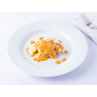 Pollo in salsa di cocco e arachidi