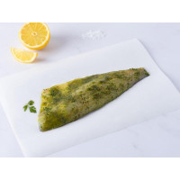 Filetto di branzino marinato alle erbe aromatiche