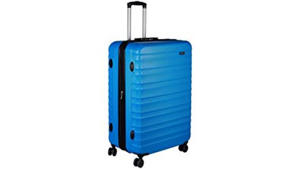 AmazonBasics - Valigia Trolley rigido con rotelle girevoli, 78 cm, Blu chiaro